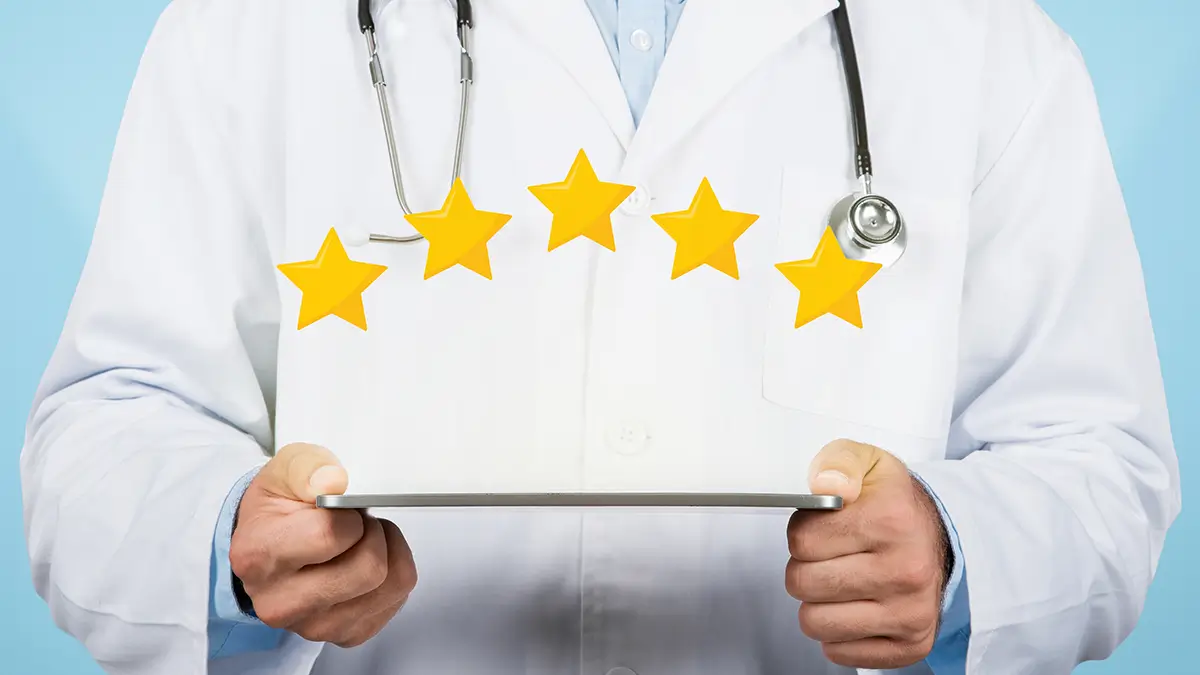 Patient leaving five-star review for eye doctor on smartphone